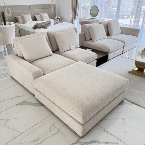 nowoczesna sofa narożna modułowa tapicerowana na zamówienie ze stolikiem