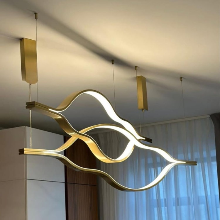 nowoczesny designerski żyrandol złoty